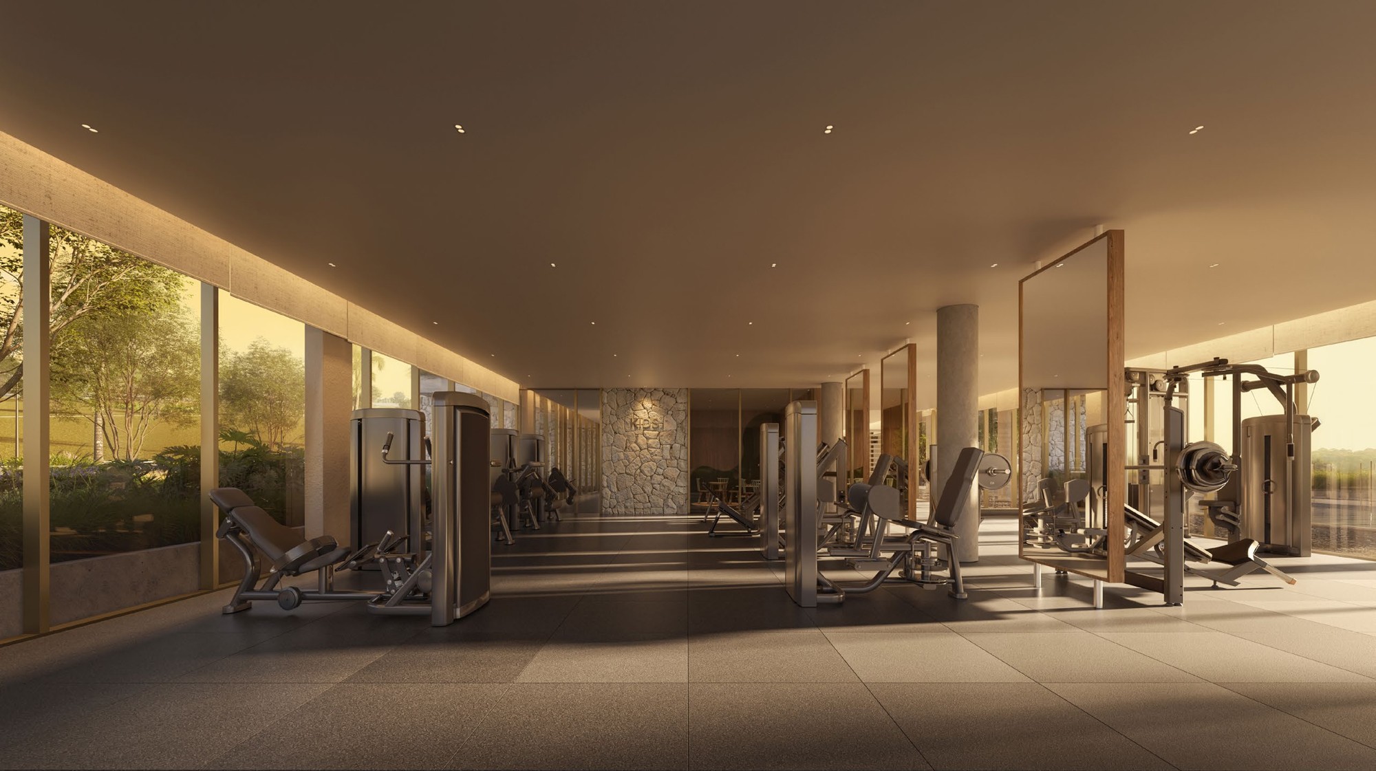 Área fitness do Vivens com equipamentos e luz natural
